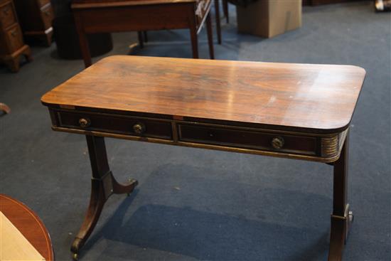 A Regency parcel-gilt rosewood centre table, in the manner of John McLean, 3ft 7.5in. x 1ft 9in. H.2ft 4in.